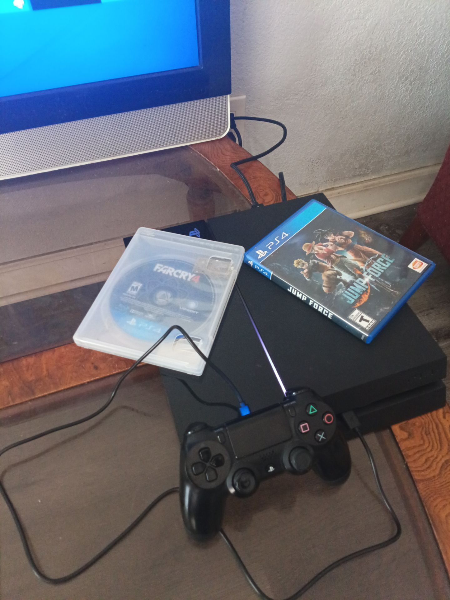 PlayStation 4 With PlayStation Plus Subscription With 100s of games