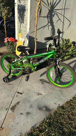 BMX. Bike size 18 like new color, green, metallic and black