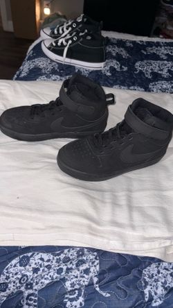 Kids Nikes size 2