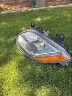 2019 International LT Left Headlight with Light Bulbs