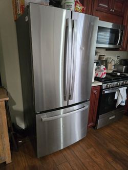 GE Stainless Steel fridge.