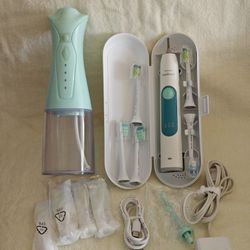 Moving sale! Philips Sonicare electric toothbrush set, toothbrush heads,water flosser