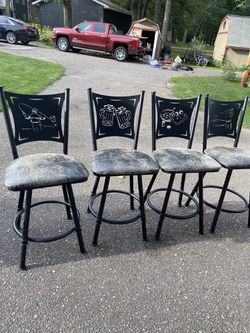 Stools. Counter height, black, weathered level, swivel for $175.