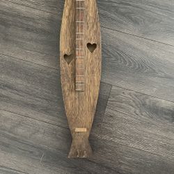 Wooden mountain dulcimer with heart soundholes