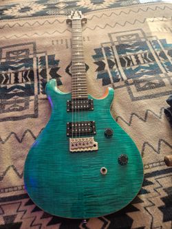 P.R.S guitar, fender amp and carrying