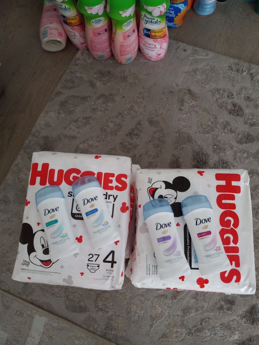2 Size 4s 2 Size 3 Huggies 4 Dove
