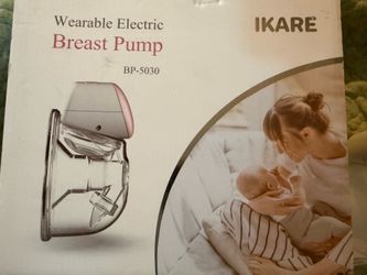 Wearable electric breast pump
