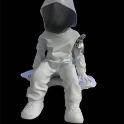 White Hooded Figure Seated Sculpture