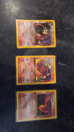 Team rocket charizard charmeleon charmander