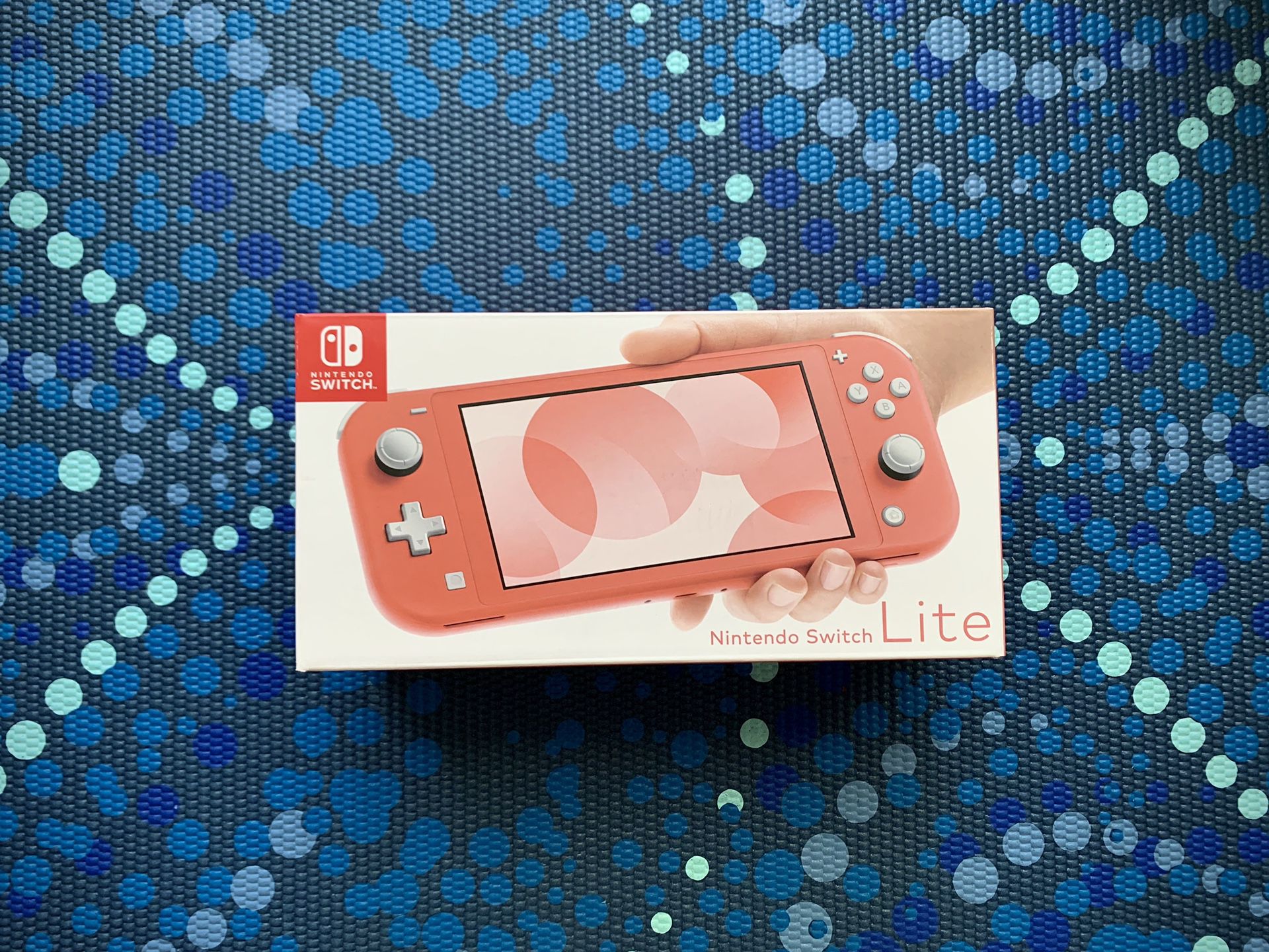 Brand New Sealed Nintendo Switch Lite (Coral)