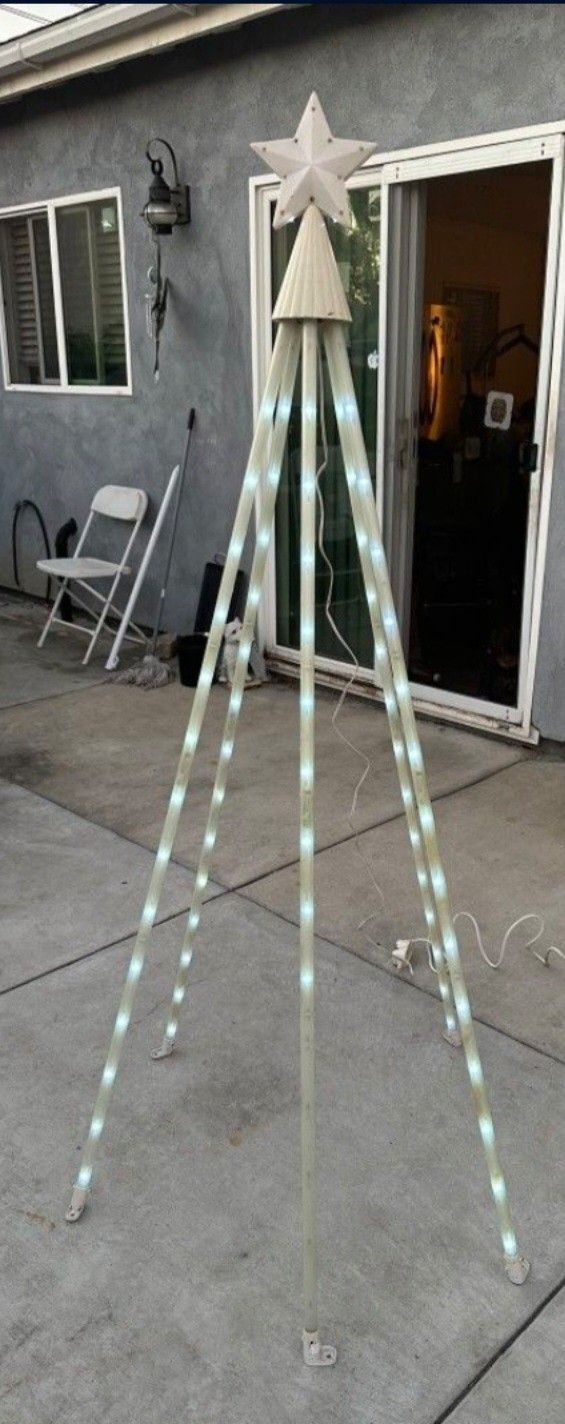 Christmas Decor Tree Lighed Indoors And Outdoors