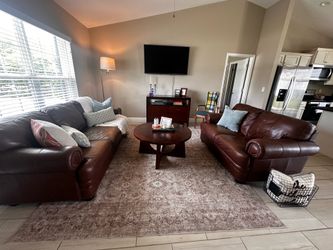 Brown Genuine Leather Couch and Loveseat