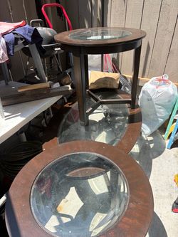 3 wooden tables with glass