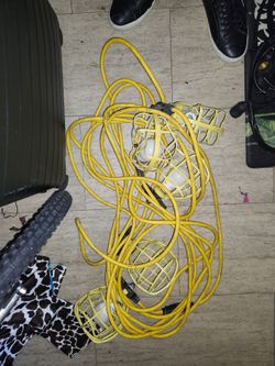 Tunnel light bulb extension cord with bulb covers