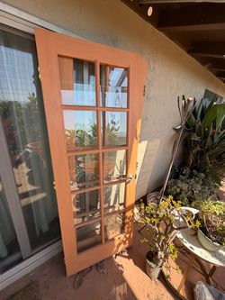 Two sets of Wood French Door with Glass Panes