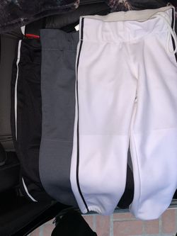 Used softball pants (Gluv) Size Youth Medium (black with white piping, grey with black piping and white with black piping)