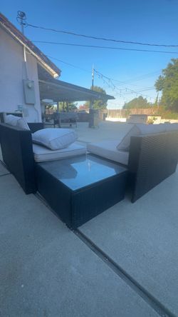 Outdoor Wicker Sofa with White Cushions