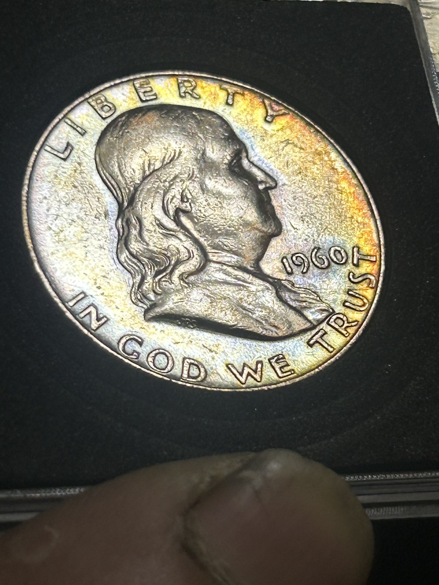 Silver 1960 rainbow tone silver half dollar Benjamin Franklin