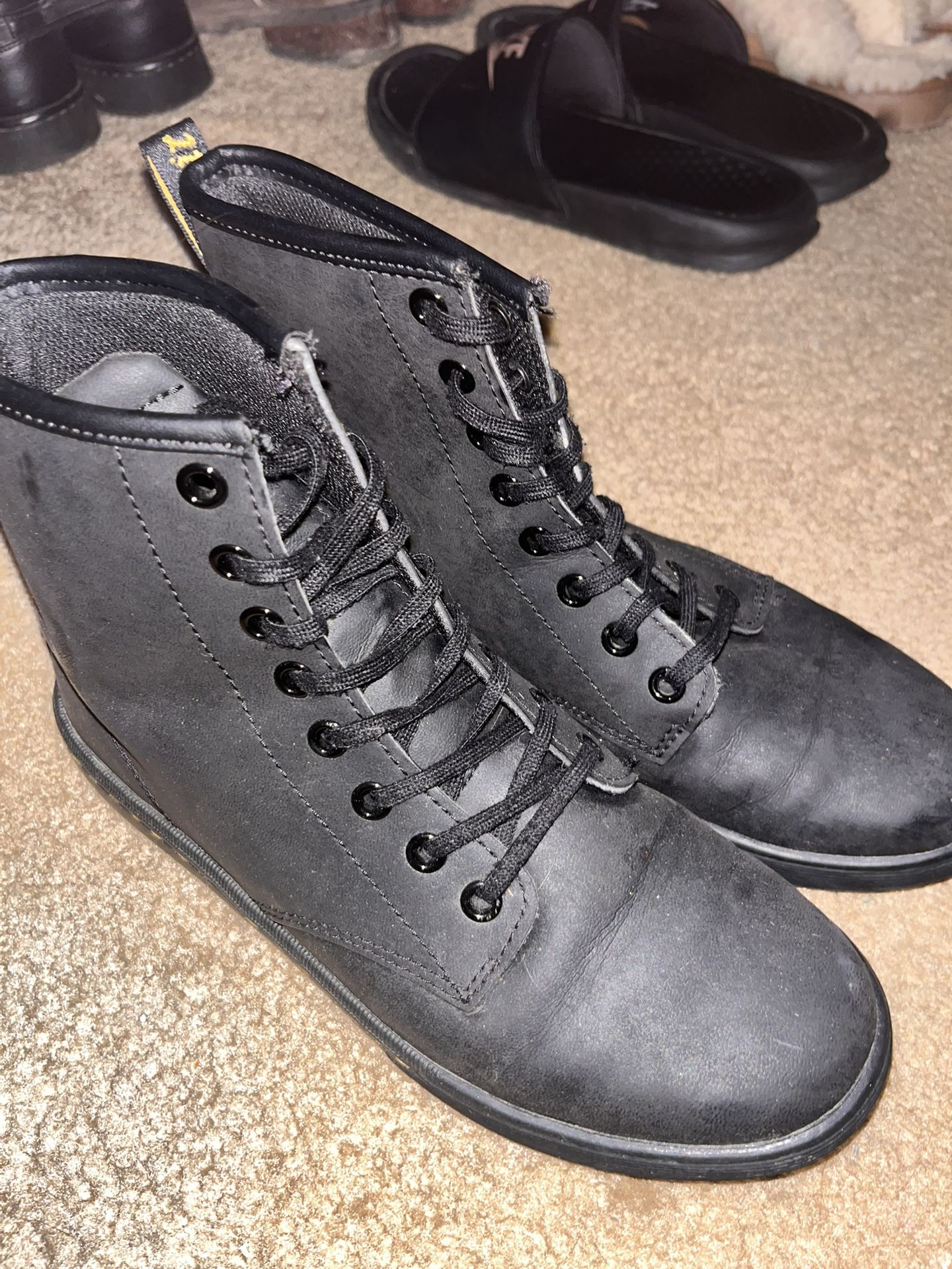 Dr. Martens boots with bouncing soles.