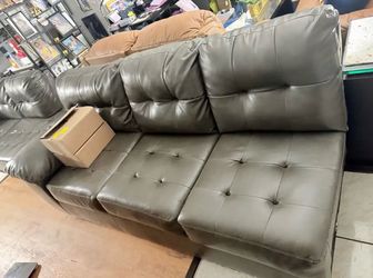 Grey leather sectional couch