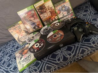 Xbox 360 in perfect condition comes with all them cables for it