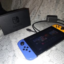 Nintendo Switch + Original Dock with games and extra controllers