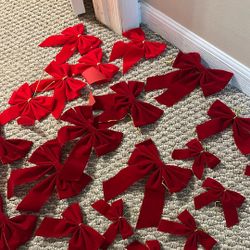 Two Christmas flowers festive ribbons for the Christmas tree