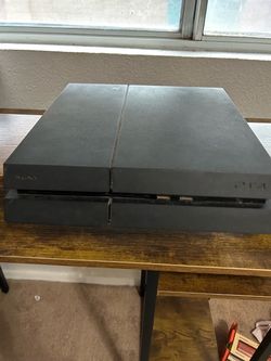 PS4 w/ controller and charging base