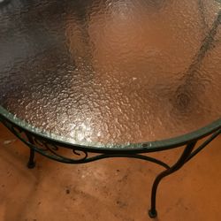 Vintage glass topped patio table 