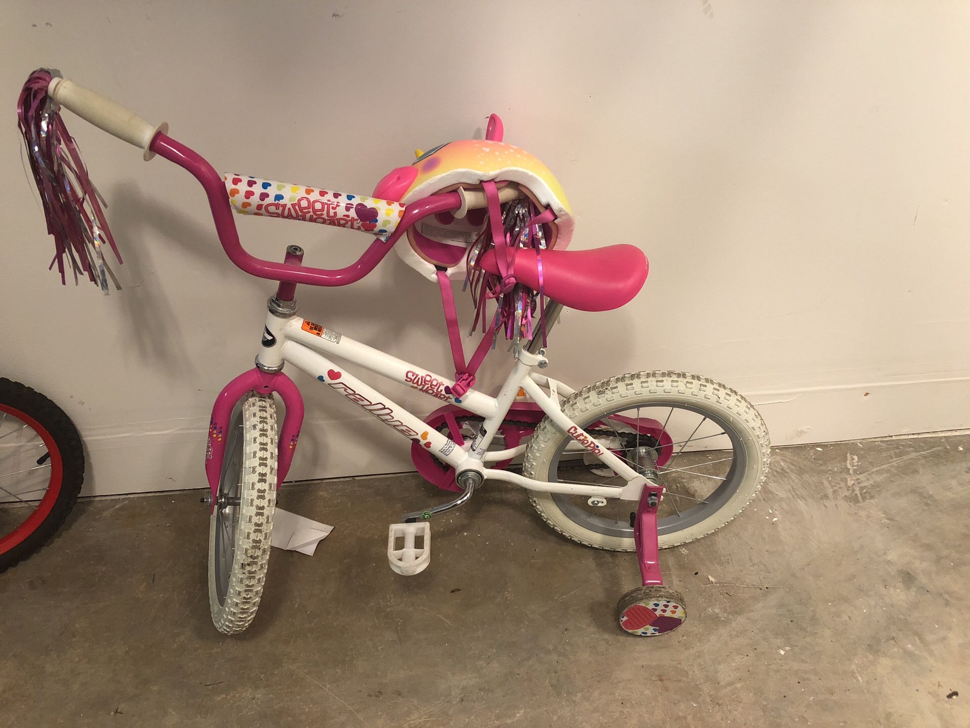Girls bike - size 3 with training wheels (and unicorn helmet)