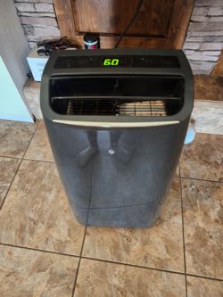LG 12000 BTU AIR CONDITIONER PORTABLE ON WHEELS WITH VENT TUBE