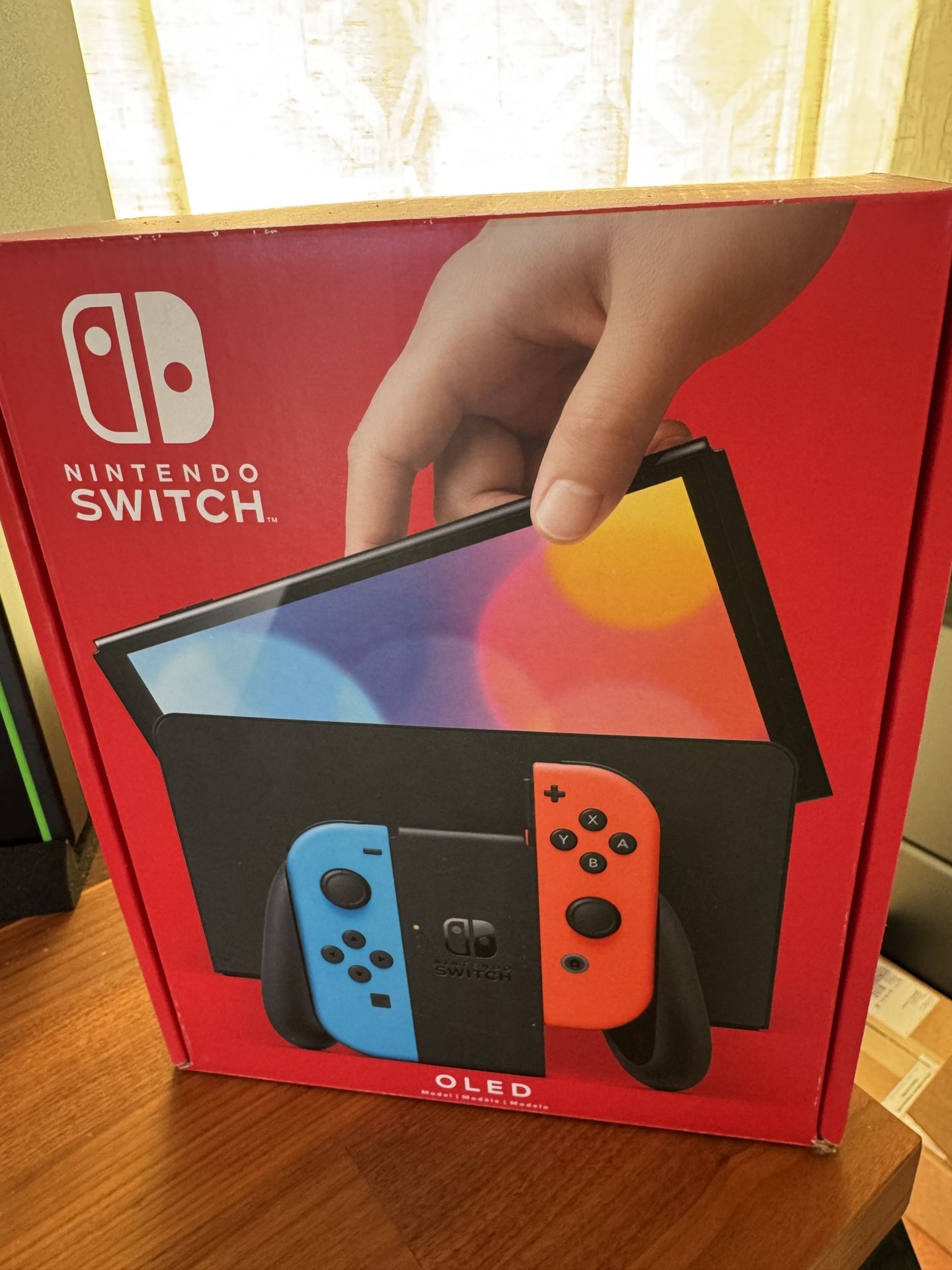 Nintendo Switch OLED (New/Never used)
