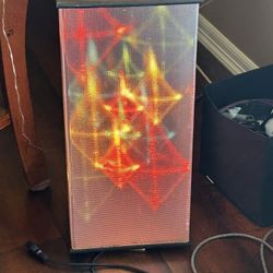 Two vintage color, light boxes that tie into your speakers where you put the speaker wires in and flash to the music. Could’ve been made by RadioShack