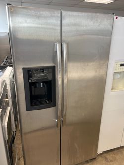 GE stainless steel side by side refrigerator  -free delivery