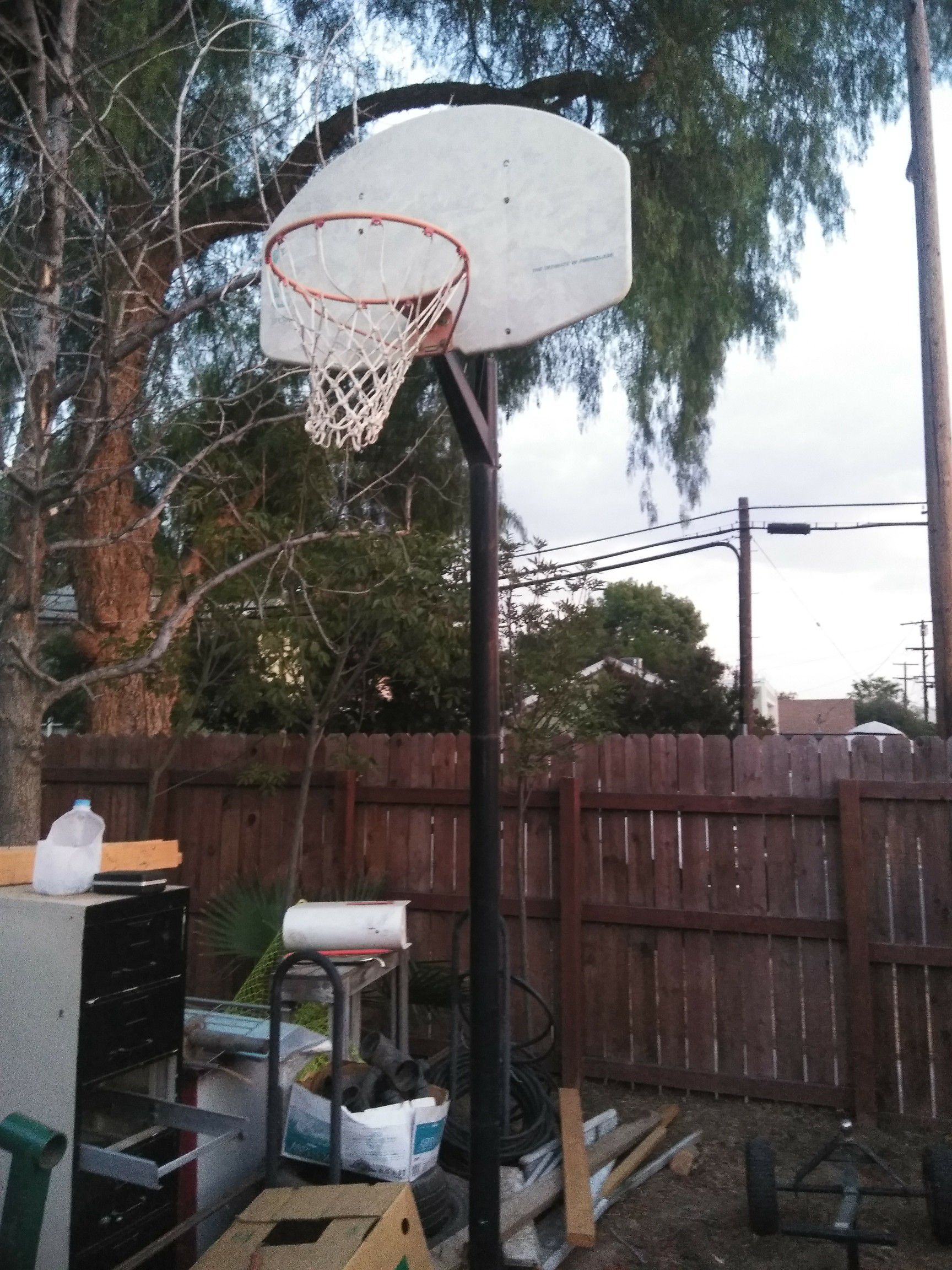 Basketball hoop with very tall pole