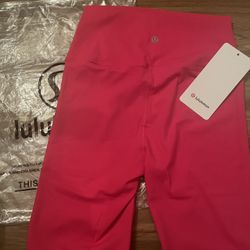 Pink size 4 lululemon activewear shorts