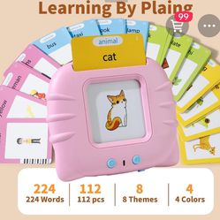 Pink mini computer speak, teach and learn. Speaks over 224 words, 112 flash cards, 8 themes Includes usb cord 