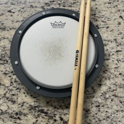 Remo practice pad & Yamaha drum sticks