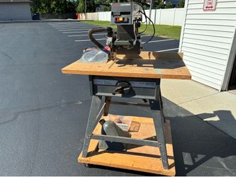 10” Craftsman Radial Saw on  stand with wheels