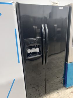 Frigidaire side by side in glossy black