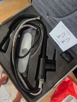 Matte black kitchen faucet with pull down sprayer