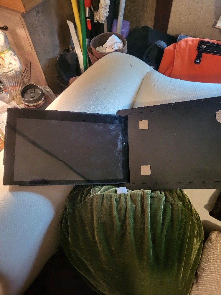 portable monitor, which is a secondary display that can be connected to a laptop, smartphone, or other devices to extend the screen.