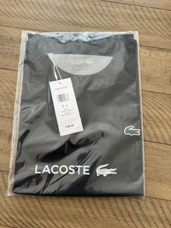Lacoste shirt.   Sport ultra dry Size L