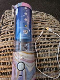 BlendJet portable personal blender in a purple and gold marbled finish. Single-button operation for easy blending. Rechargeable and lightweight for qu