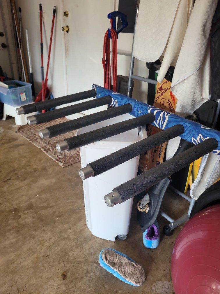 Surfboard wall rack 