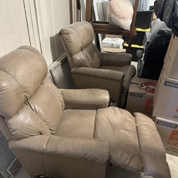 Two Leather Reclining Chairs