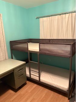 IKEA bunkbed with 2 clean twin mattresses included.
