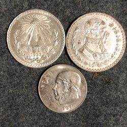 Three Transitional Un Peso Coins