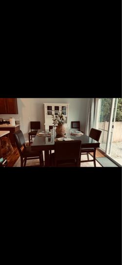 Fine dining table with 8 chairs