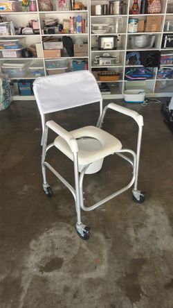 Shower chair/ bed side comode